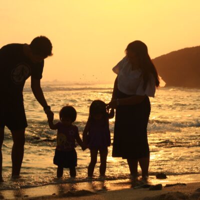 a family enjoying a warm sunset