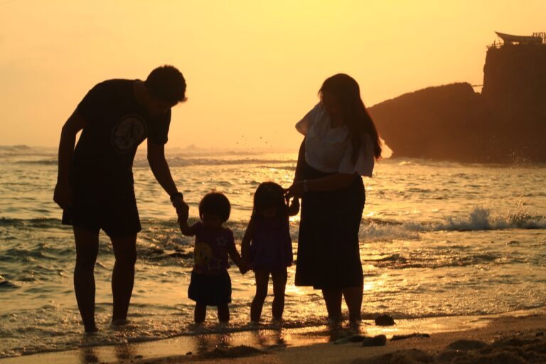a family enjoying a warm sunset